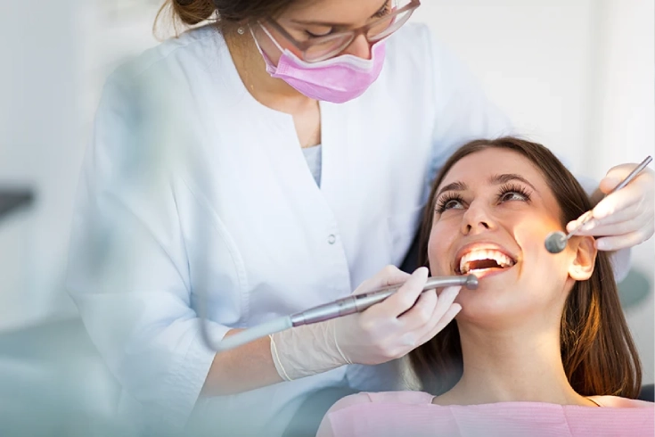 Girl Routine checkup after dental implants